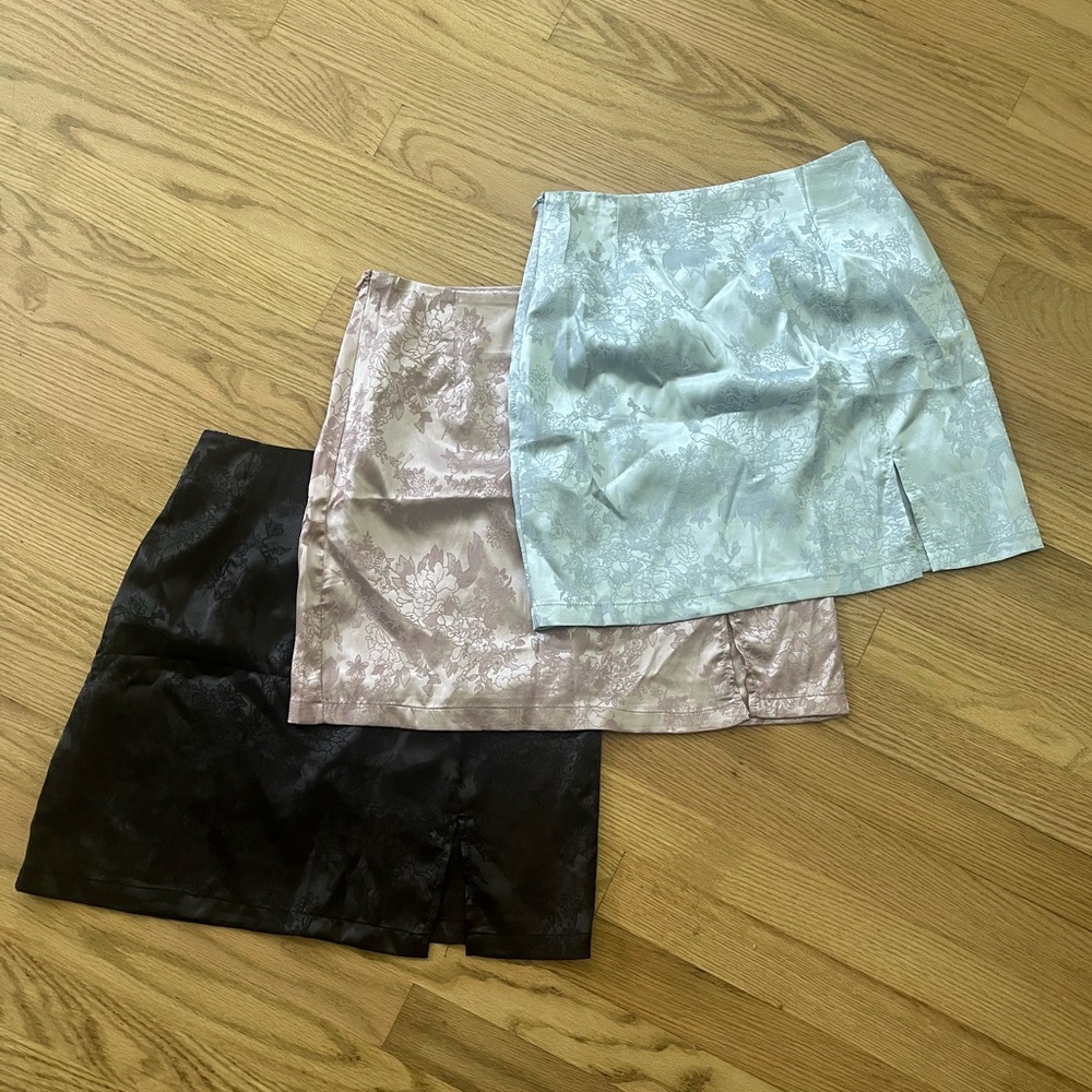 set of three satin skirts